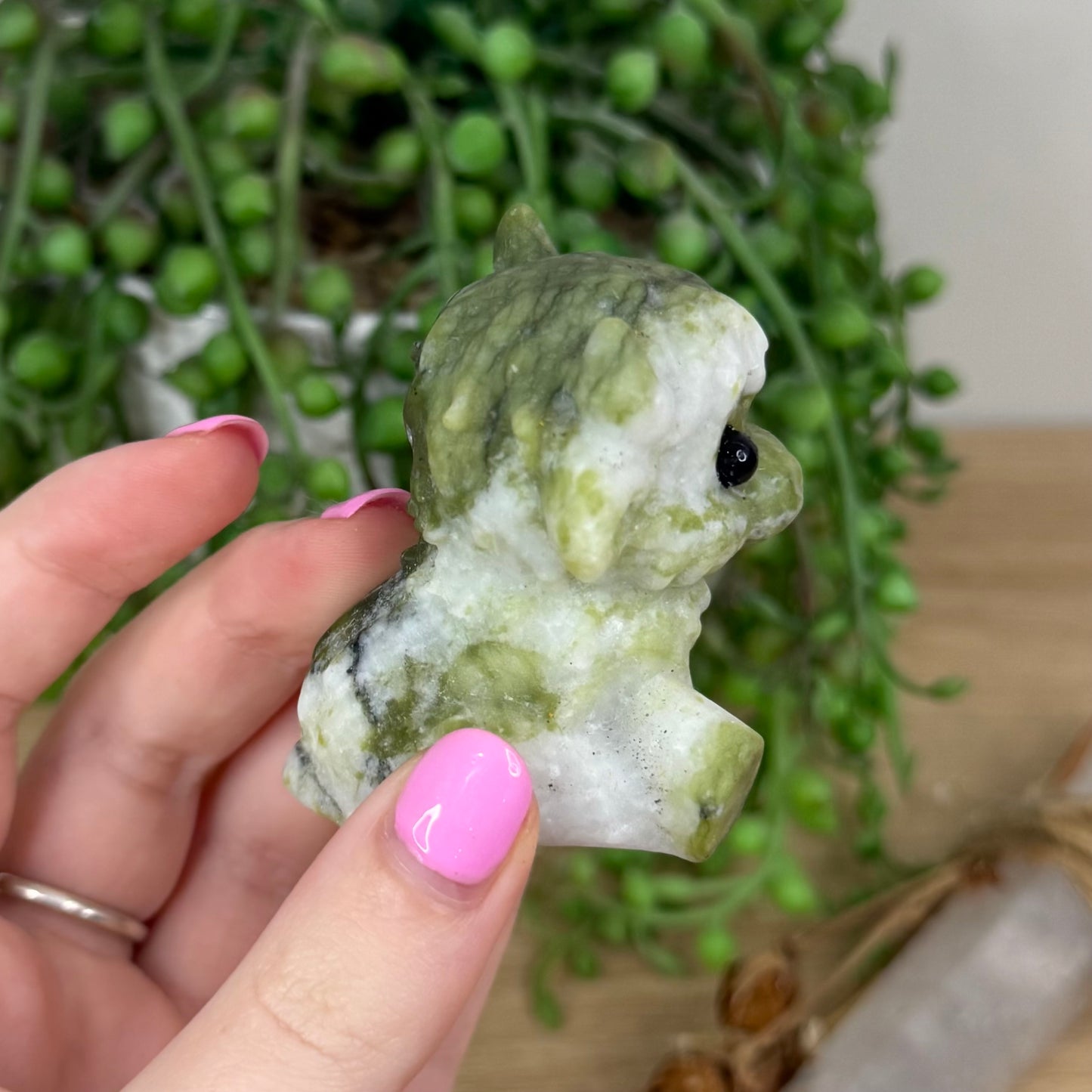 Green Jade Sitting Highland Cow (X395)